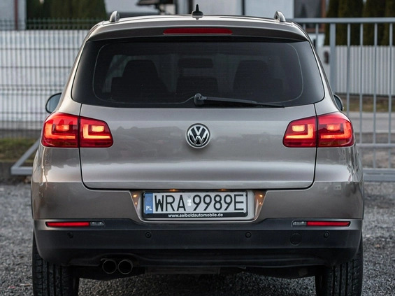 Volkswagen Tiguan cena 53700 przebieg: 299000, rok produkcji 2014 z Wojkowice małe 497